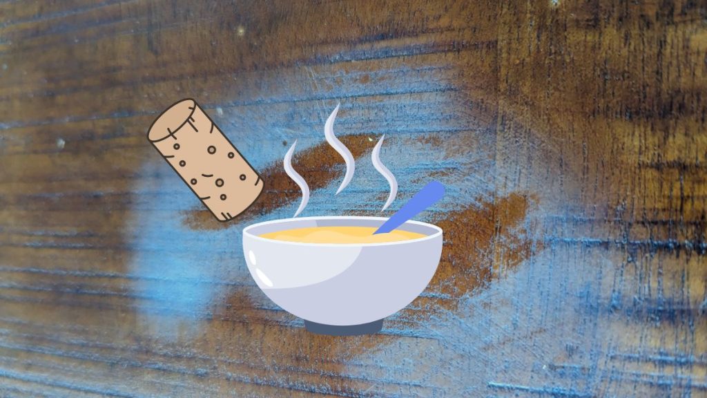 Enlever une tache blanche sur du bois avec un bouchon de liège